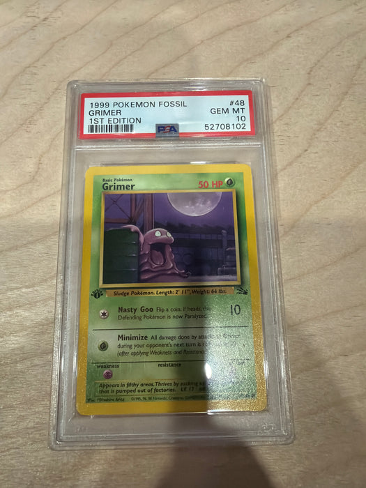 PSA 10 1999 Pokemon Grimer 1st Edition Fossil